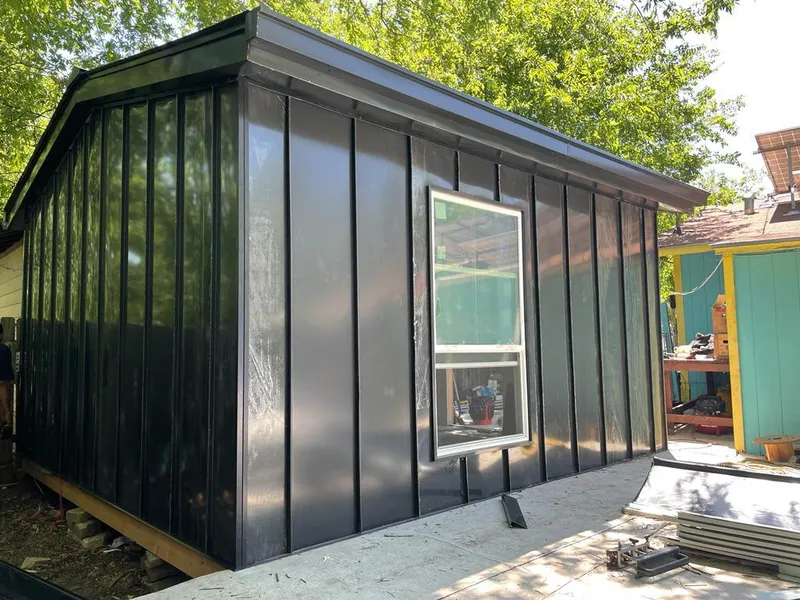 Black standing seam metal wall panels for Roof Inspection in Upper Gwynedd